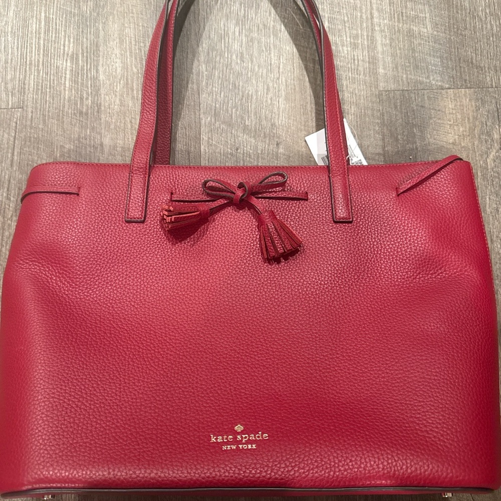 kate spade red pebbled leather shoulder tote with tassel